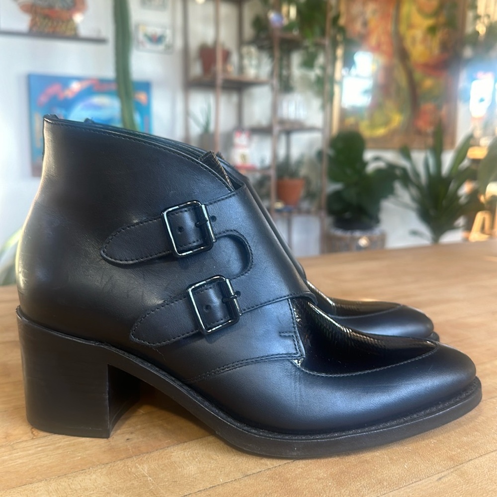 The office of Angela Scott miss Joan boots sz 8